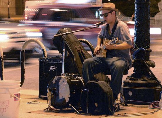 Busker at midnight, Michigan Ave, Chicago IL